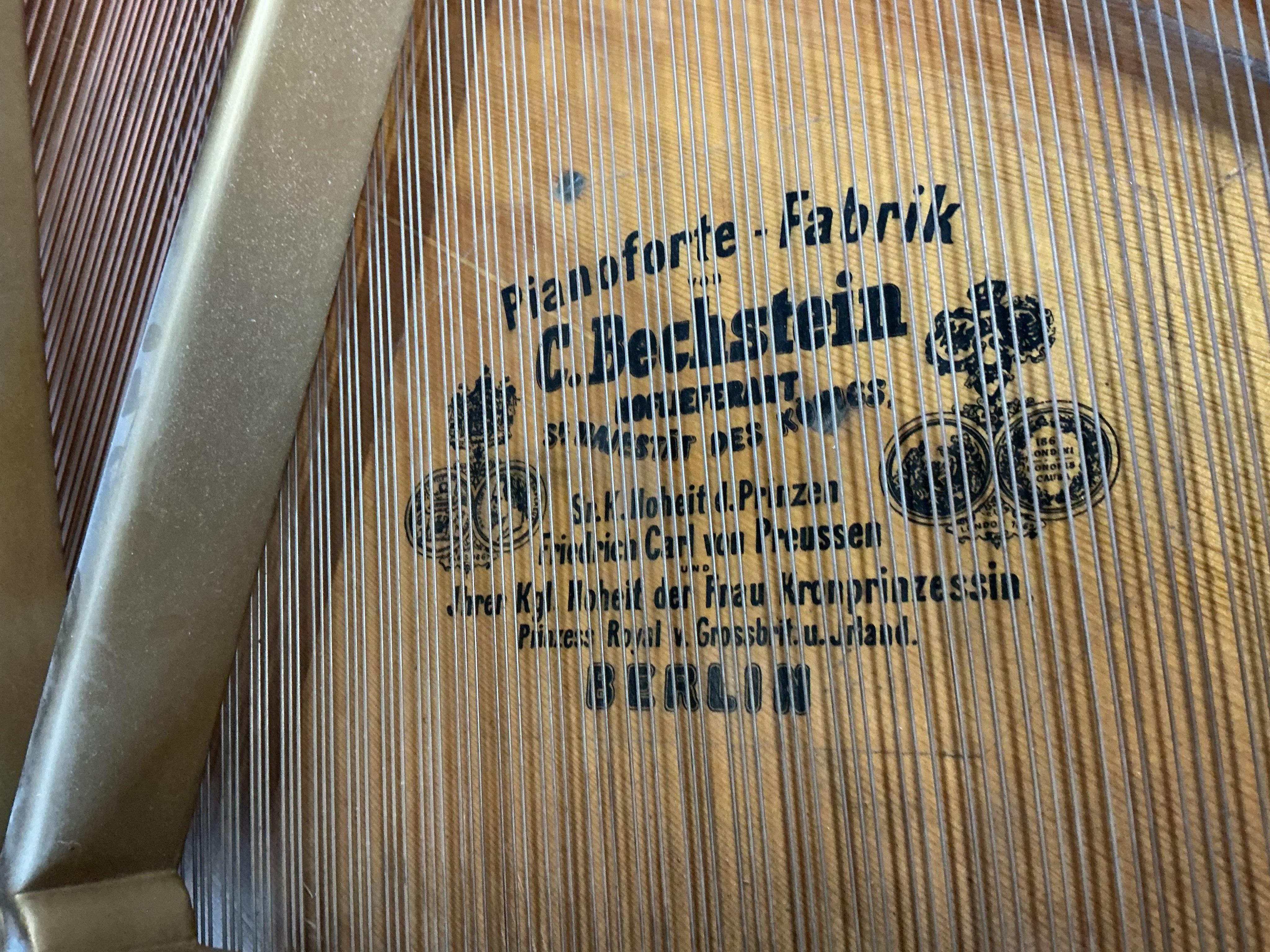 An early 20th century Bechstein 6ft. 8in. rosewood grand piano retailed by Harrods and duet piano stool, Provenance: Owned by Sally Matthews (internationally renowned Opera singer)